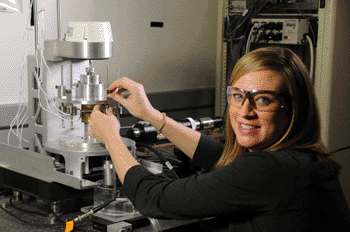 Image: Biomedical engineer Jenni Popp with NIST’s prototype bioreactor for tissue engineering. The bioreactor both stimulates and evaluates engineered tissue as it grows (Photo courtesy of Burrus/NIST).